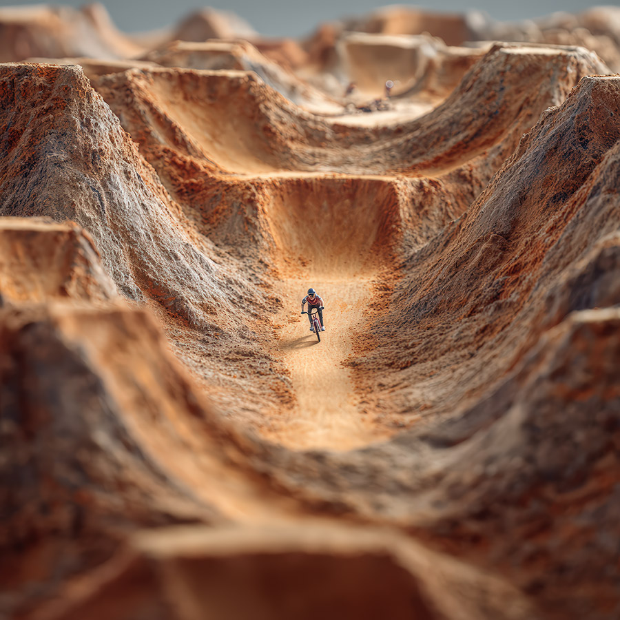 dirt bike rider riding through a giant race track