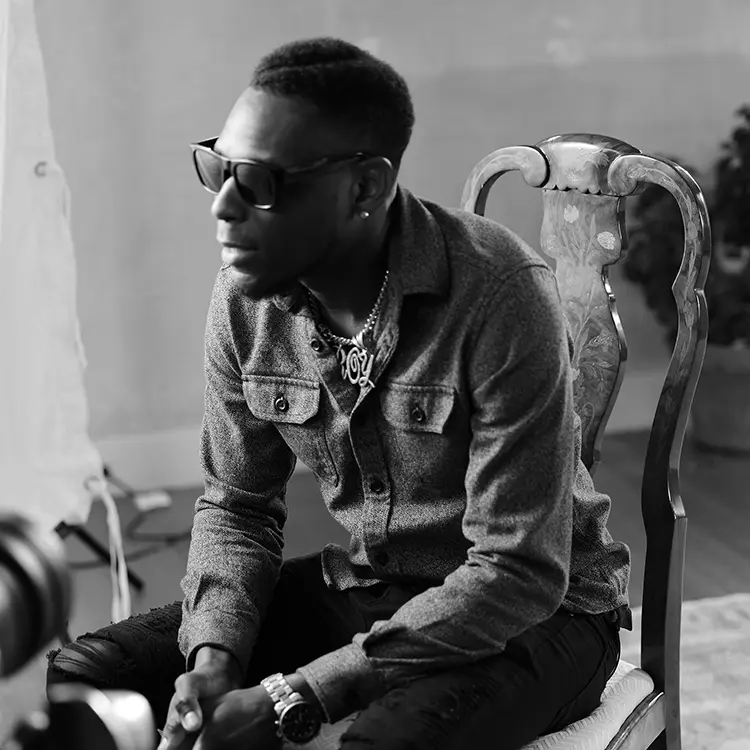 Delric Pollins leaning forward in his chair